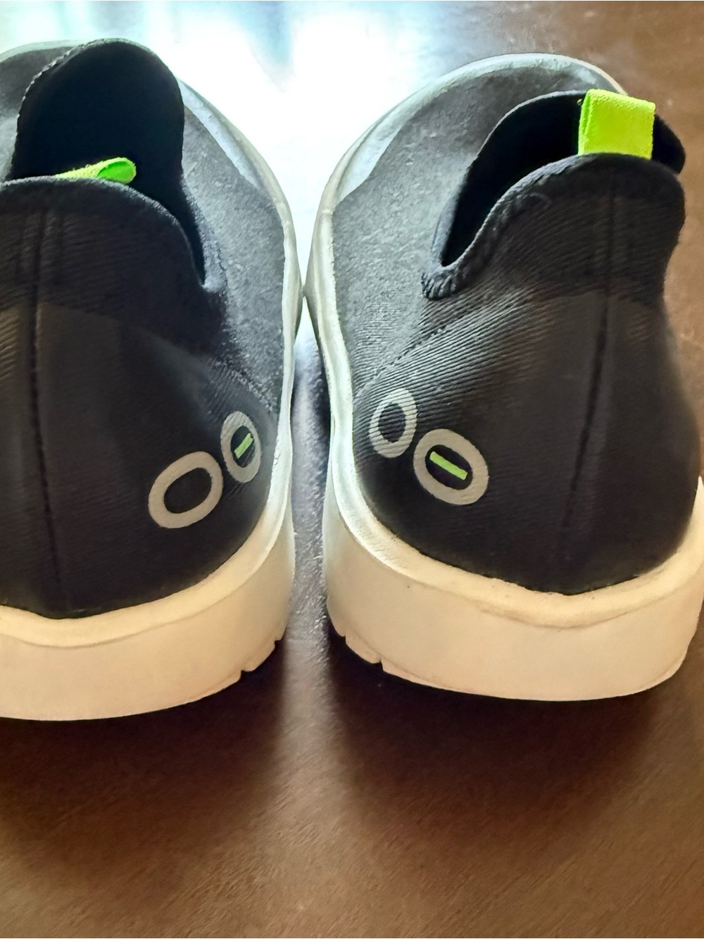 Women’s OOFOS Slip-On Canvas Recovery Sneakers in Black with Neon Accents